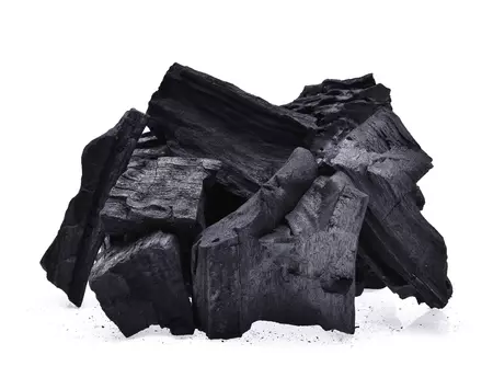 79588220 charcoal isolated on white background
